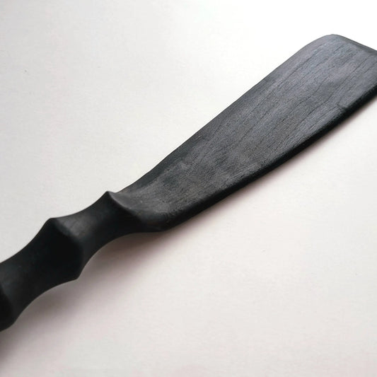 Schwarze Holzspatel
